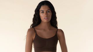 Tan woman representing Amber shade